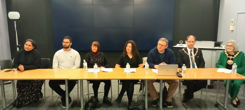 Photo of the speakers table.